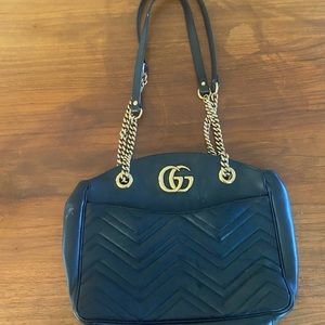 Leather Gucci bag with gold chain
